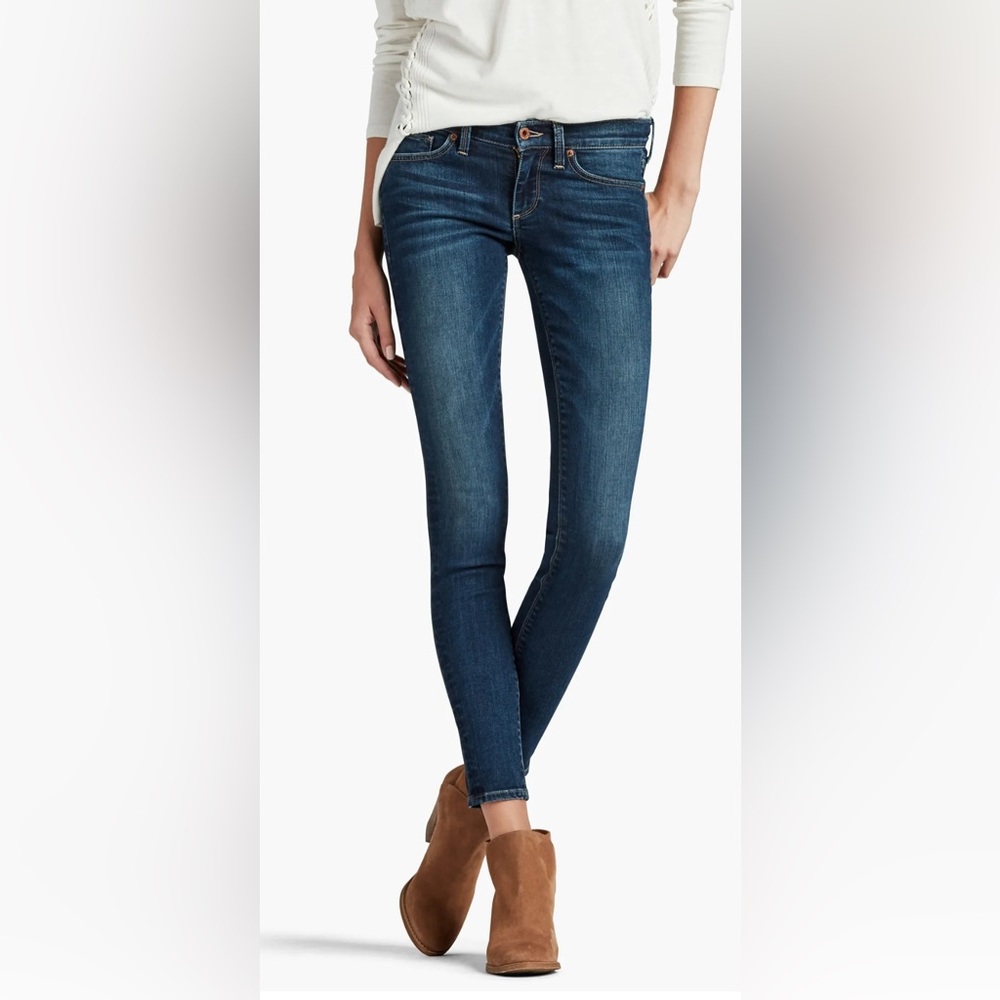 Lucky brand jeans, Charlie skinny style. Has paint on bottom left leg.